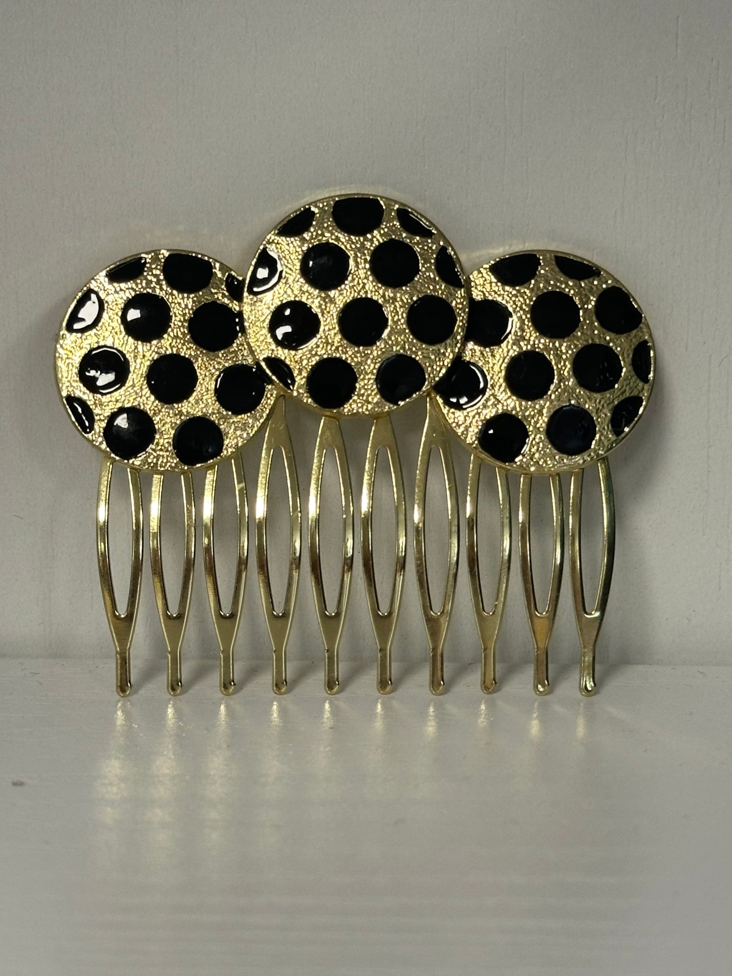 Peinecillo lunares